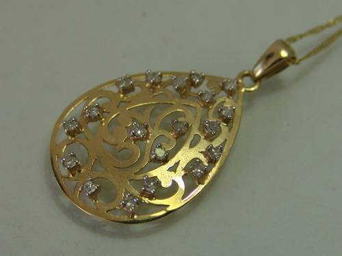 10ct Yellow gold teardrop pendant with 18 natural diamonds on a 9ct yellow gold chain