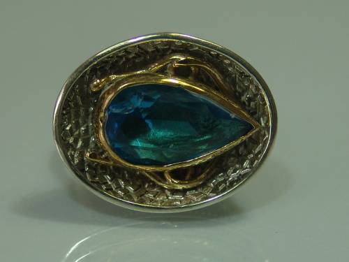 Chunky and heavy silver and Gilded Ring set with blue stone, 10.1grams
