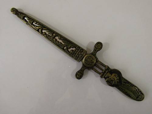 Vintage metal paper knife in the shape of a sword / dagger