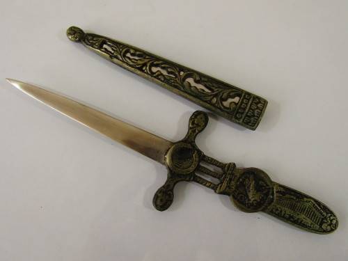 Vintage metal paper knife in the shape of a sword / dagger