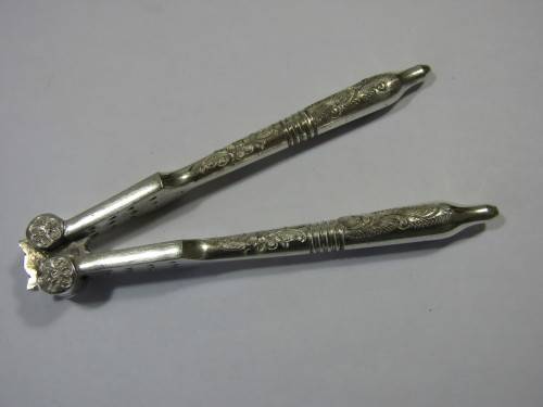 Vintage boxed set of 3 Victorian silverplated items, 2 nut crackers and one sizors