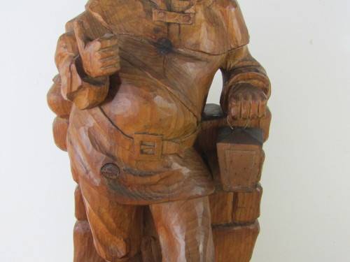 Very large vintage wooden carved Continental figurine of a Man with a lamp, 55cm x 22cm x 15cm