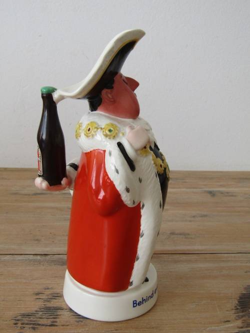 A humerous Beswick Character toby Jug "Behind every great Man", large 23cm