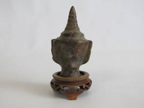 Very old Burmese Bronze Buddha Head on wooden Stand in excellent and aged condition, 13cm tall