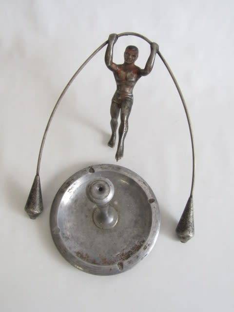 Rare large vintage metal "Balancing Man" statue on Plinth with Ashtray Base, 36cm high