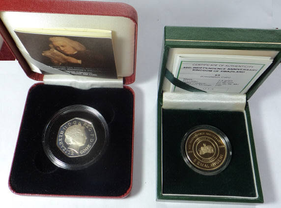 Two Boxed Commemorative Coins of 2005 & 2008 (Great Britain & Swaziland)