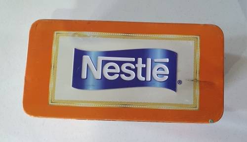 Nestle tin as per photos