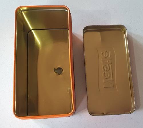 Nestle tin as per photos