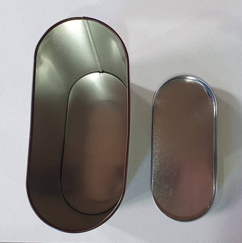 Brown tin with image of a rabbit as per photos