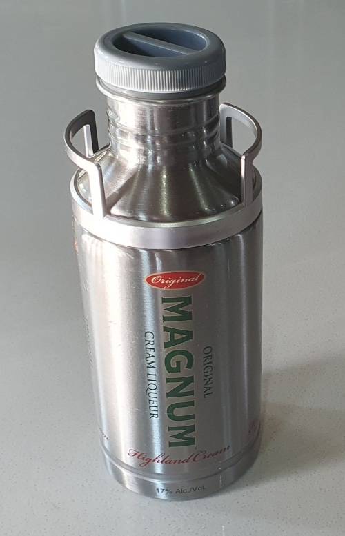 MAGNUM cream liqueur tin as per photos