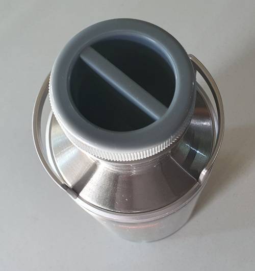 MAGNUM cream liqueur tin as per photos