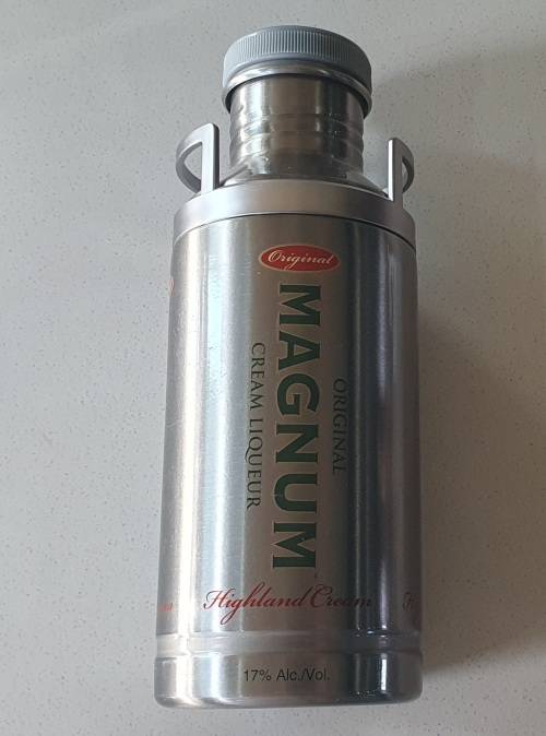 MAGNUM cream liqueur tin as per photos