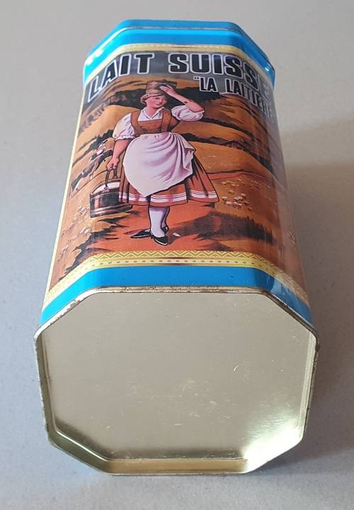 NESTLE tin as per photos