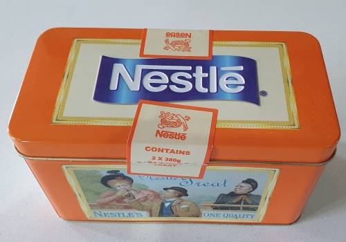 NESTLE treat tin as per photos