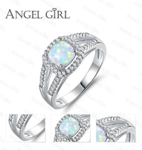 Exquizite Queen ring with simulated Fire Opal and white gold polish