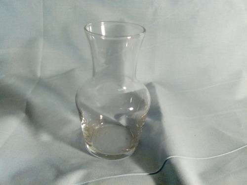 I  HAVE A WONDERFUL GLASS CARAFE - NO CHIPS OR CRACKS - REAL NICE PIECE!!