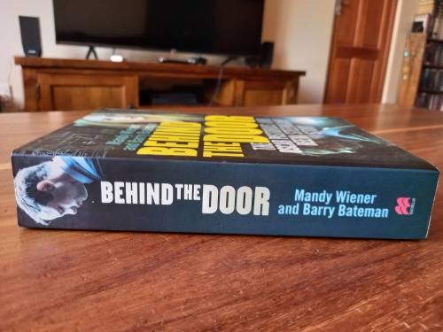 BEHIND THE DOOR: The Oscar Pistorius and Reeva Steenkamp Story by Mandy Wiener - Large Softcover