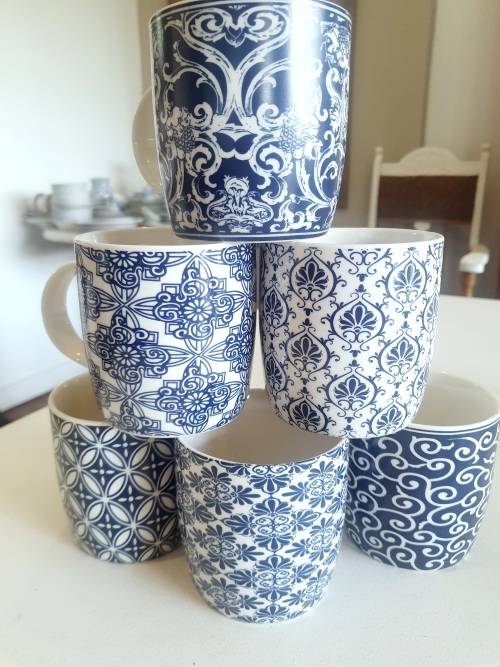 Set of six blue and white mugs