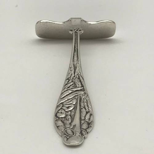 Early Sterling Silver `Stork` Baby Food Pusher
