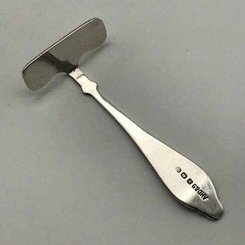 Early Sterling Silver `Stork` Baby Food Pusher