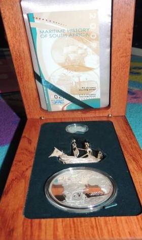 2009 Combination set R2 Crown and 2 and a half Tickey, Sterling silver boat.