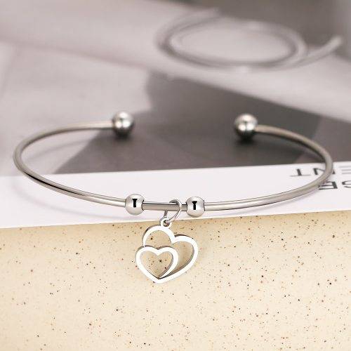 RETAIL PRICE: R 999 Adjustable Titanium "Hearts" Charm Bangle (GOLD )