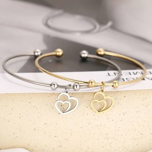 RETAIL PRICE: R 1299 Adjustable Titanium "Double Heart" Charm Bangle (SILVER ONLY)