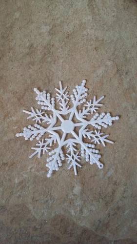 Plastic snowflakes for decor - frozen or winter party - 7cm - white