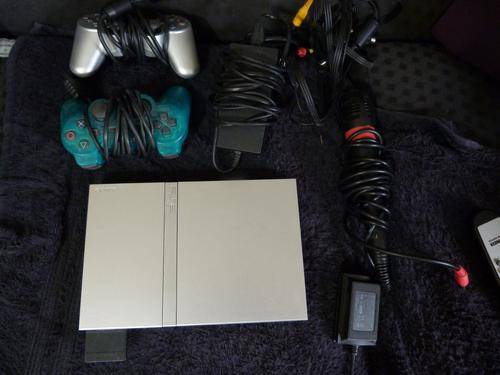 Playstation 2 Bundle with 75 Games, 2 controllers, Memory Crad & 2 Singstar Mic's