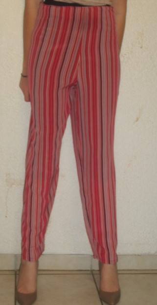 SHADES OF RED PANTS. SIZE 18. AS NEW
