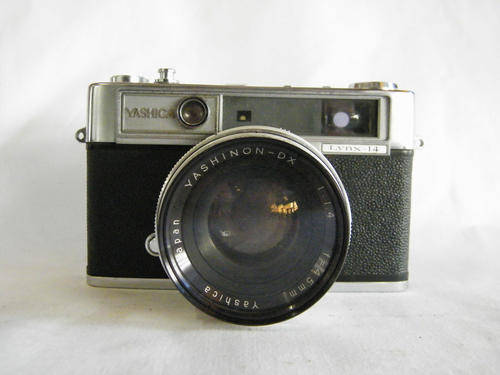 Yaschica Lynx-14 camera with Yashinon-DX 1:1.4 lens in leather pouch - as per photo
