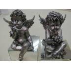 Two angels with birds