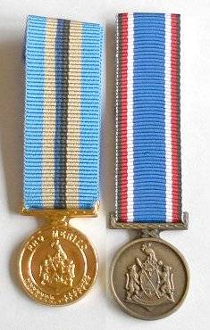 MINIATURE CISKEI PRO MERITO DECORATION & LS&GC MEDALS