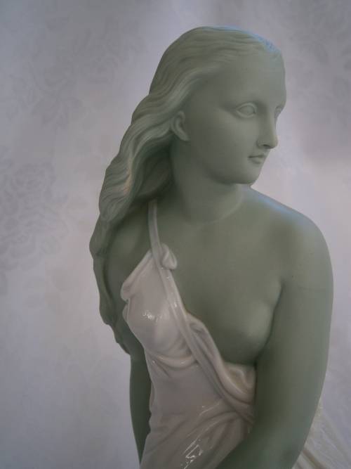 Minton part Glased and green tinted parian Figure  `MIiranda`, late 19th century
