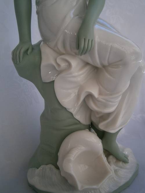 Minton part Glased and green tinted parian Figure  `MIiranda`, late 19th century