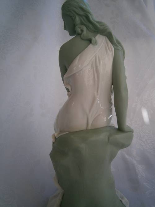 Minton part Glased and green tinted parian Figure  `MIiranda`, late 19th century