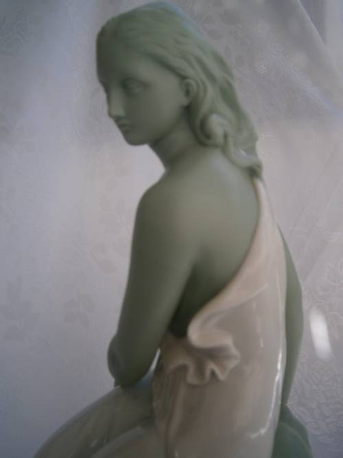 Minton part Glased and green tinted parian Figure  `MIiranda`, late 19th century