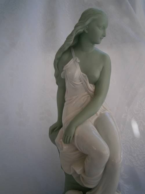 Minton part Glased and green tinted parian Figure  `MIiranda`, late 19th century