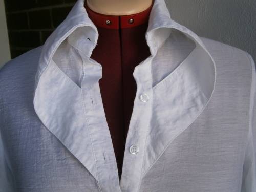 Stylish  long sleeve blouse with interesting collar  in size M