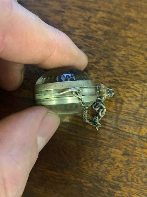 Globe shaped pocket watch