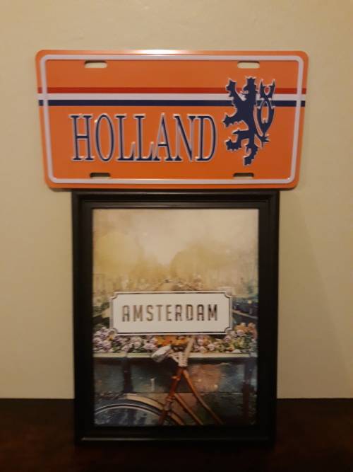 A Holland Plaque (Metal) and an Amsterdam Picture in Frame