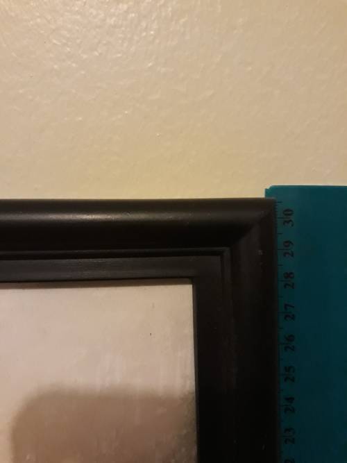 A Holland Plaque (Metal) and an Amsterdam Picture in Frame
