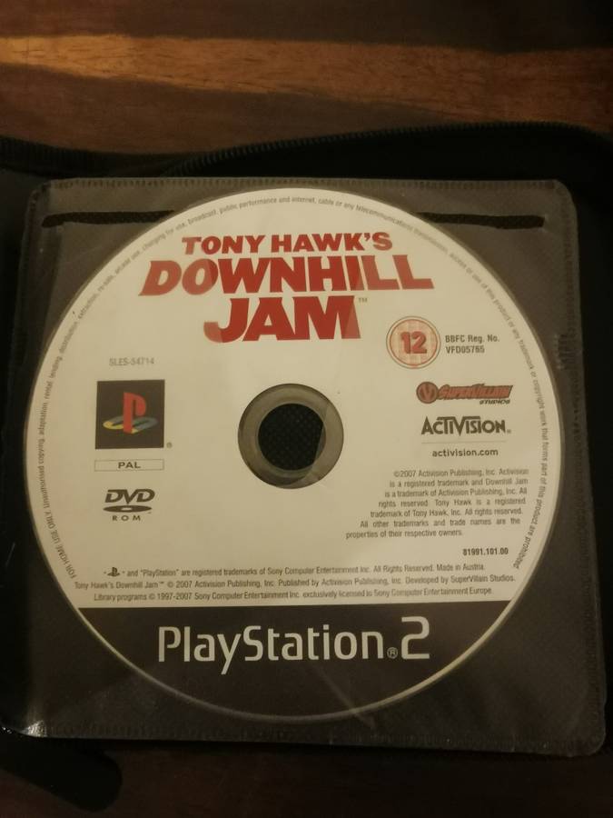PlayStation 2 with Wireless Remote and Memory Card Including CD Case with 13 Games