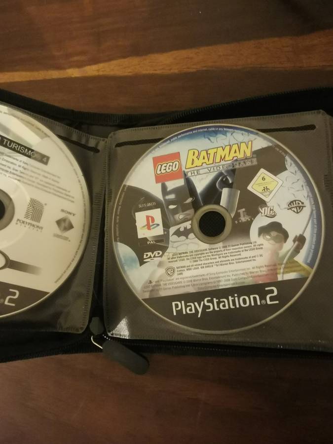 PlayStation 2 with Wireless Remote and Memory Card Including CD Case with 13 Games