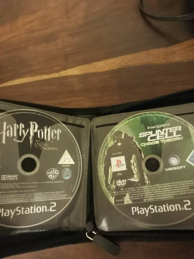 PlayStation 2 with Wireless Remote and Memory Card Including CD Case with 13 Games