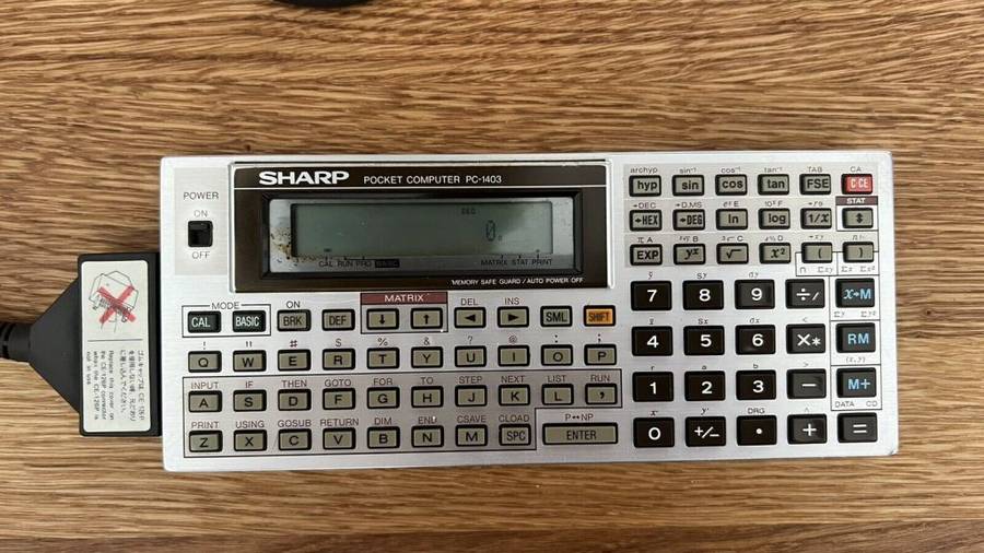Two vintage Sharp Pocket Computers PC-1401 plus two SHARP Printers CE-126P