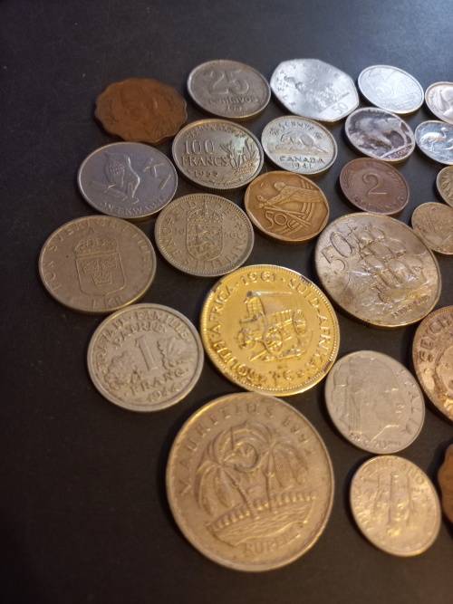 29 Interesting mixed coins. Bid per coin to take all.