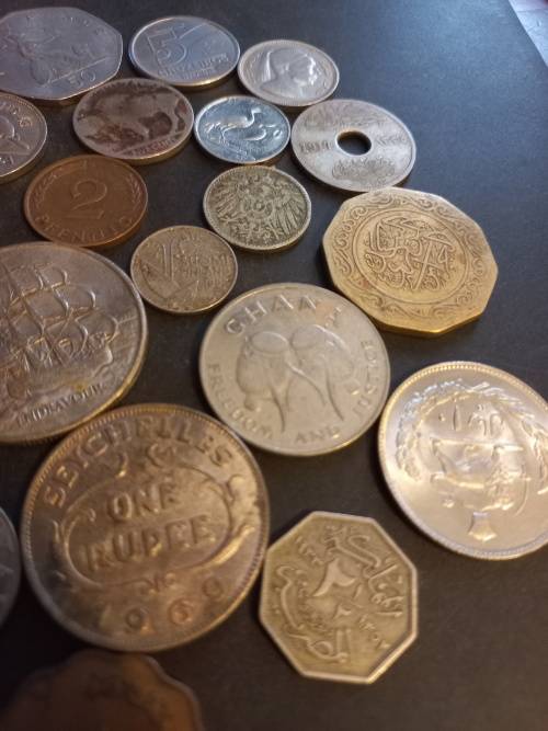 29 Interesting mixed coins. Bid per coin to take all.
