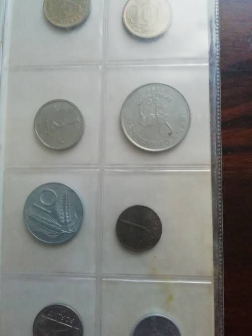 Bickels Coin Album with sleeves and 58 mixed coins.