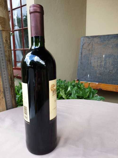 AN OLD BOTTLE OF SIMONSVLEI CABERNET SAUVIGNON - MERLOT